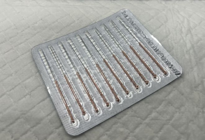 九游官网入口：果然财经｜中医风刮进宠物界毛孩子也开始做针灸了(图3)